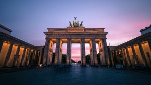 A city trip to Berlin includes visiting the Brandenburg Gate.