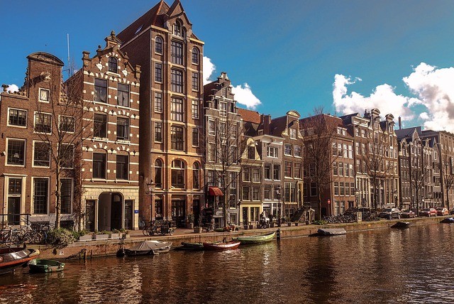 The classical buildings with facades are Must see's in Amsterdam.