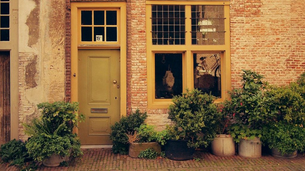 Things to do in Leiden include walking and searching for inner gardens surrounded by houses.